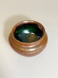 Small copper and green ceramic vase