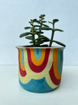 Retro upside down rainbow pot